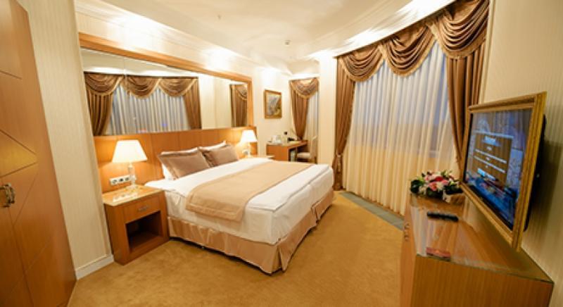 Boutique Hotel Buta Minsk Buitenkant foto A bedroom at the hotel